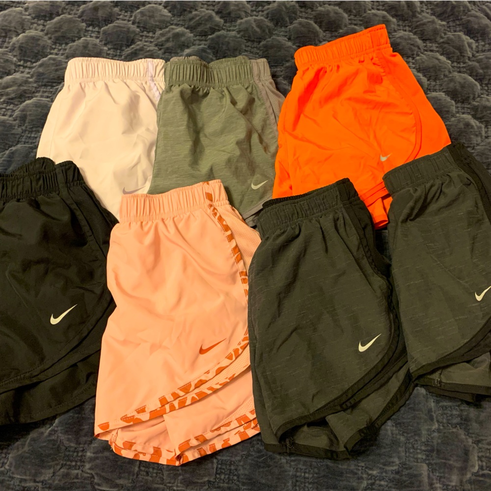 Lot of 7 pairs of Nike running shorts. Excellent new condition. 70$ takes all.